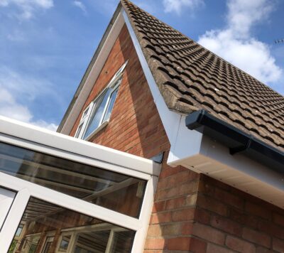 White Fascias Black Guttering